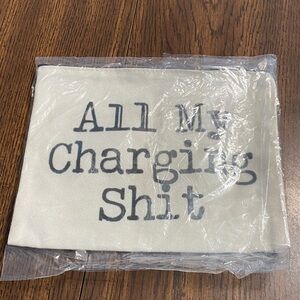 “5/$20” white bag with black zipper closure